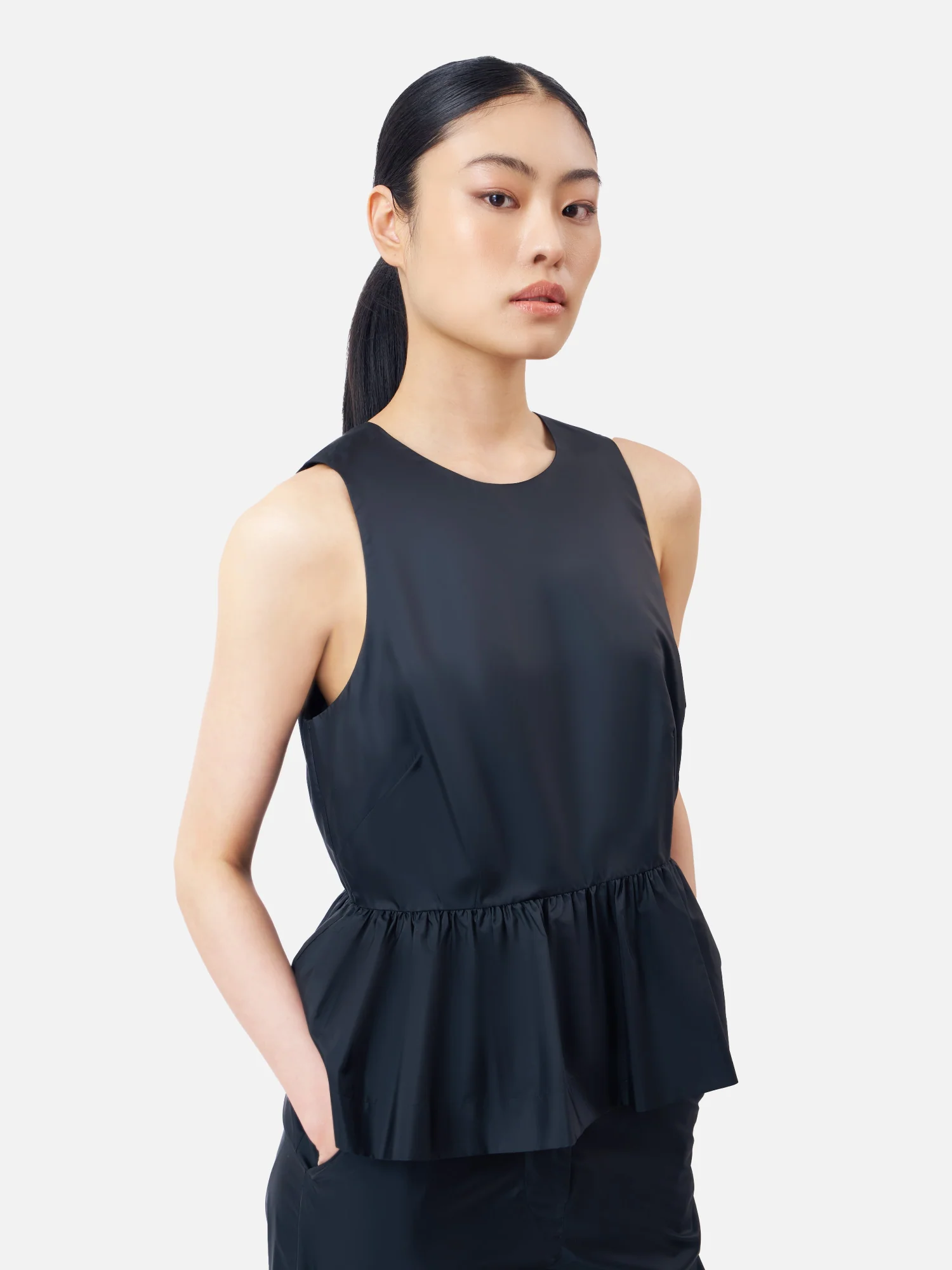 Solid Silk Sleeveless Peplum Top - Image 10